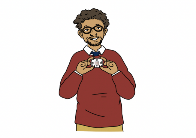 Male teacher holding up a micro:bit